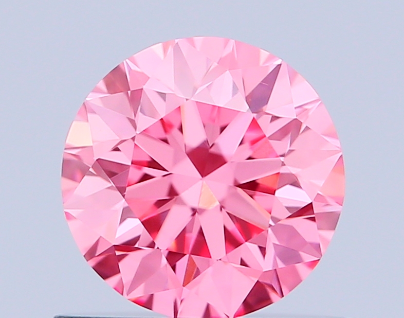 0.6ct Round Fancy Vivid Pink VS1 IGI