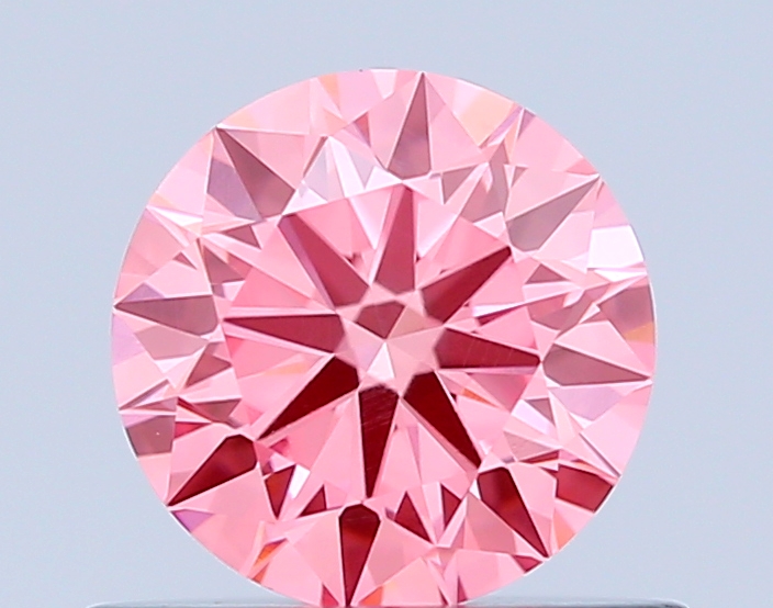 0.6ct Round Fancy Vivid Pink VVS1 IGI