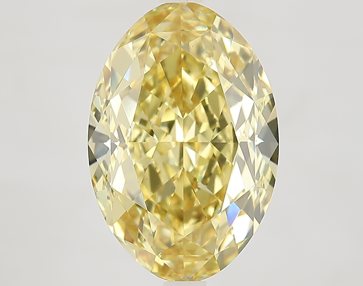 7.1ct Oval Fancy Intense Yellow VVS2 IGI