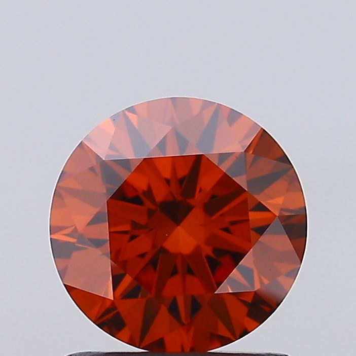 1.1ct Round Fancy Vivid Orange VS1 IGI