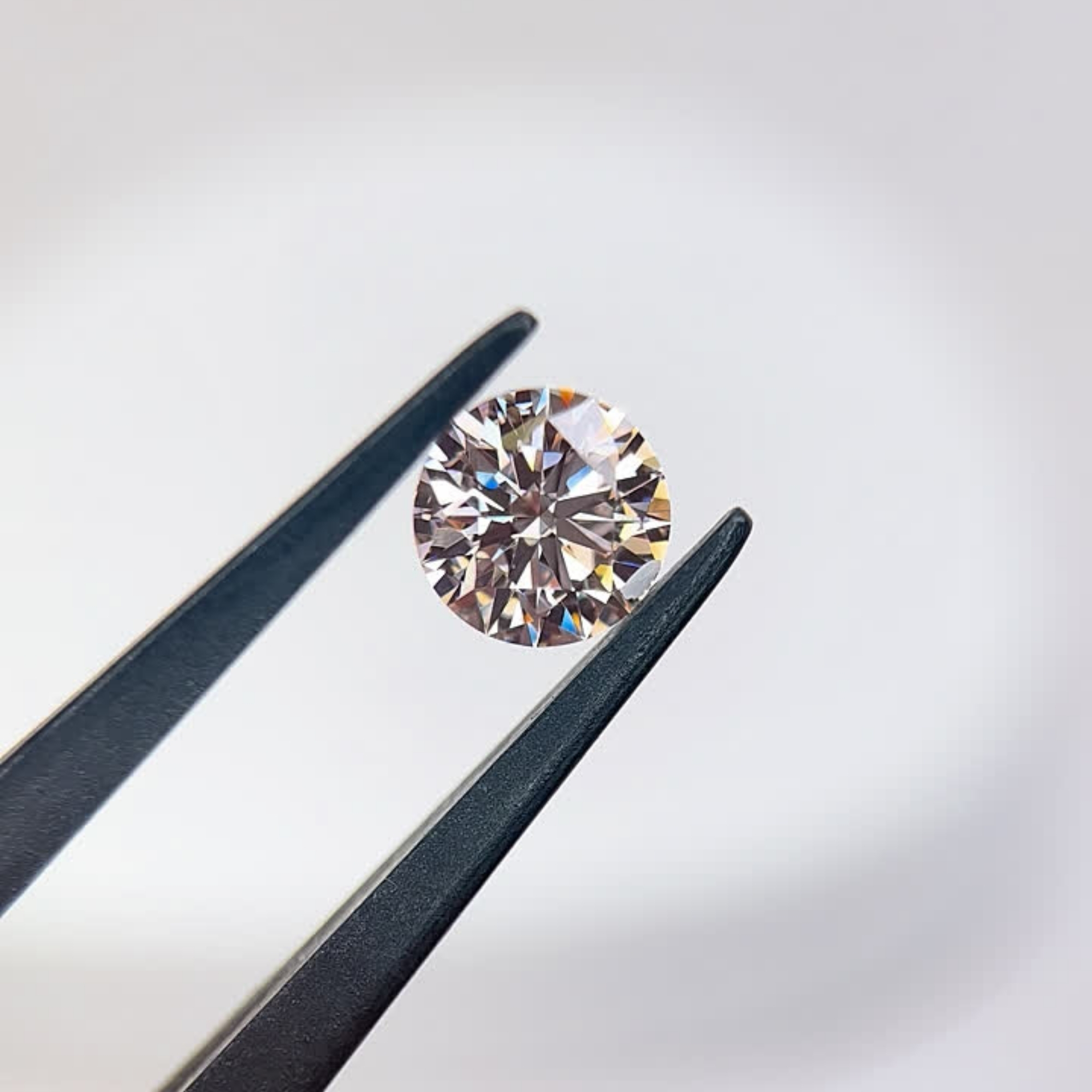 1.5ct Round Fancy Pink VVS1 IGI