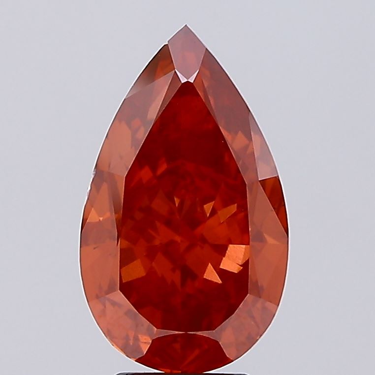 7ct Pear Fancy Vivid Orange VS1